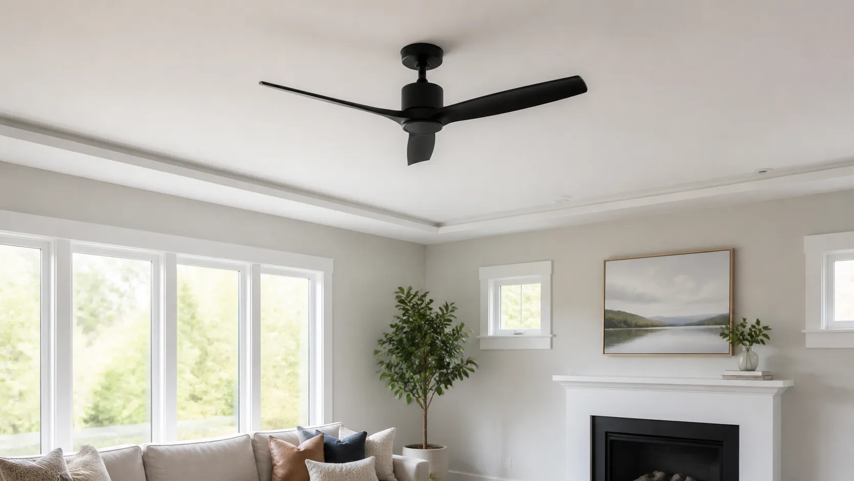 Modern black ceiling fan in a bright finished living room